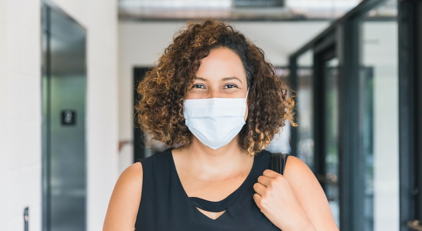 Woman wearing a mask - Otis elevator safety study