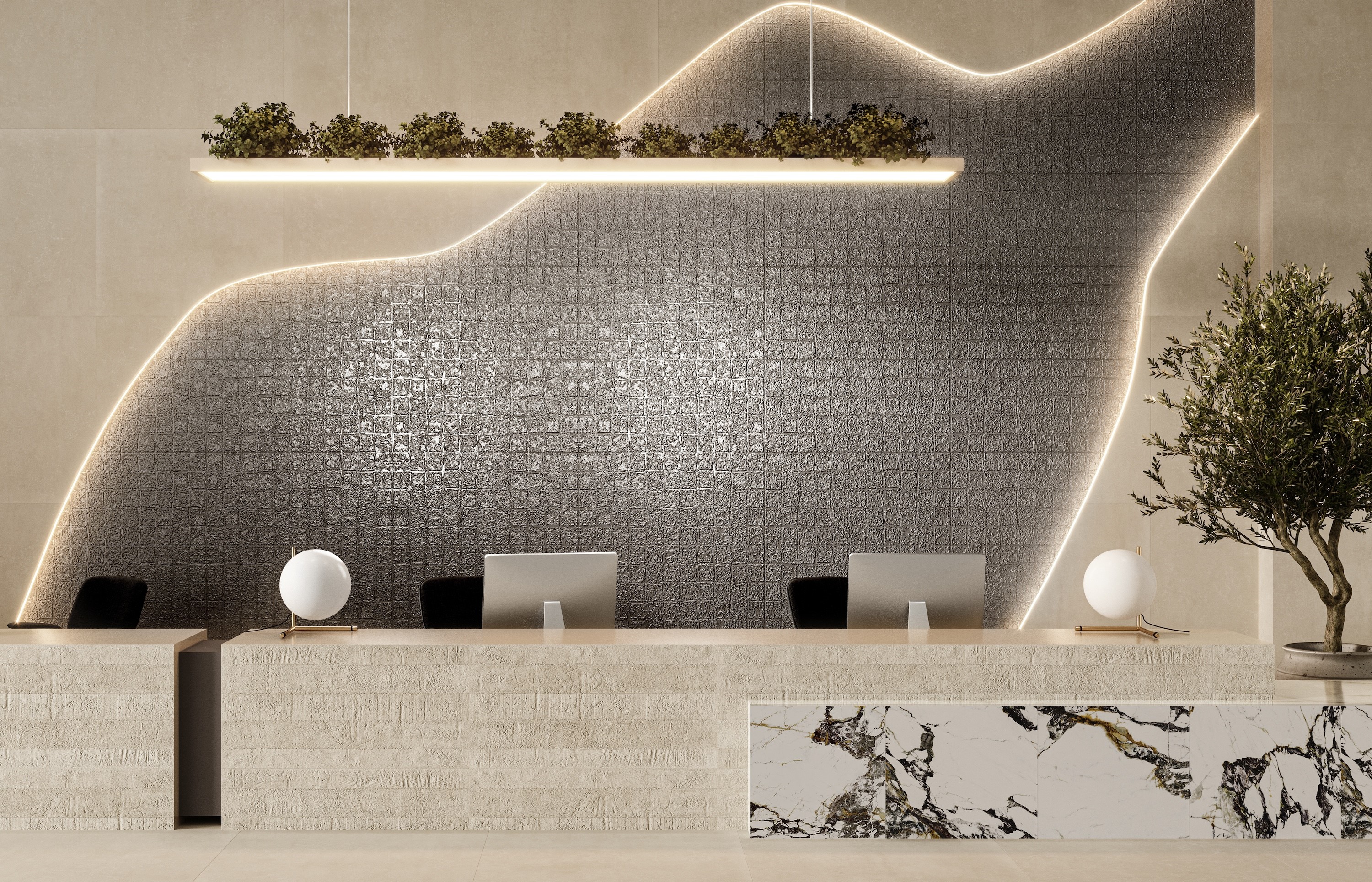 Greige tile wall with hanging plants and long reception desk with computers
