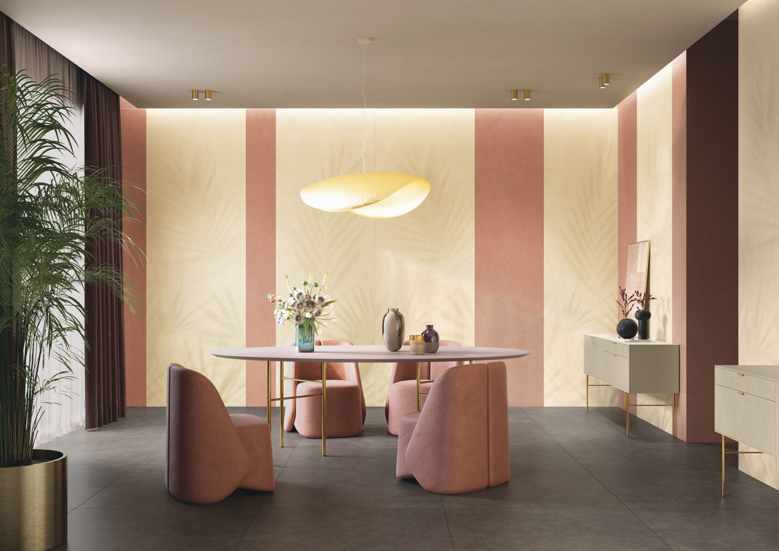 Circular table and chairs in room with large-format porcelain tiles on wall in large vertical color stripes.