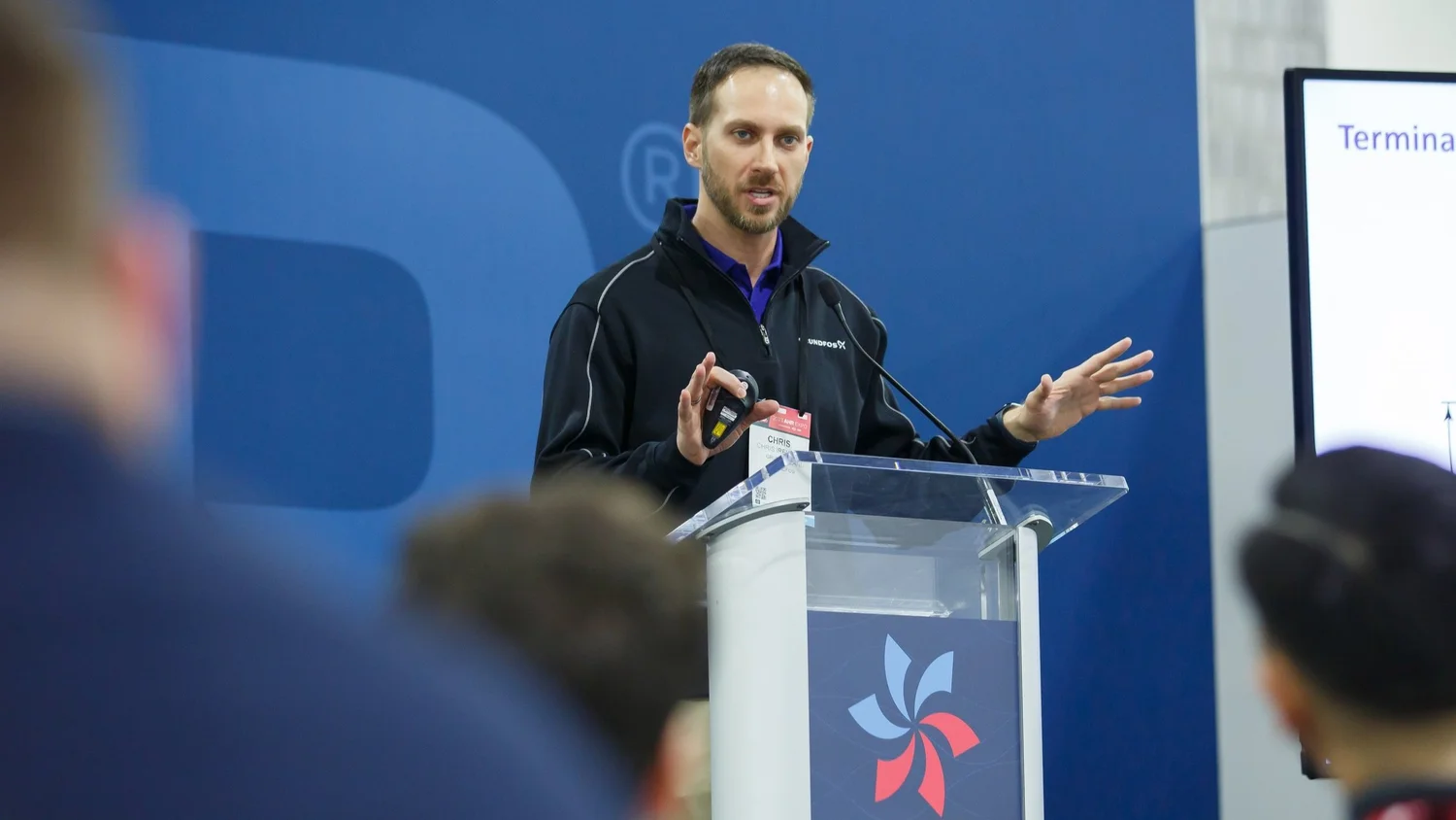 Speaker at AHR Expo podium