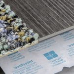 Interface LVT and carpet with glue-free installation backing