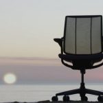 Mesh ergonomic chair on beach