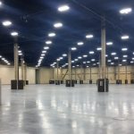 Open exhibit space showing lighting in ceiling