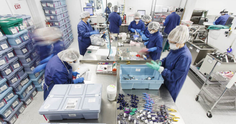 Workers in Medline ReNewal device reprocessing facility
