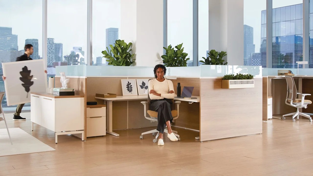 Teknion's Leverage workstation - woman sitting in front
